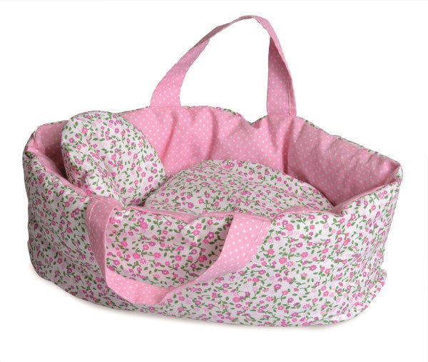 Carry cot with flower print bedding